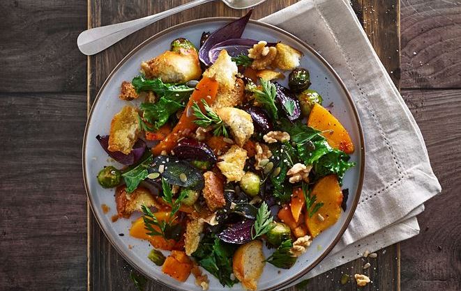 Classic Italian panzanella is actually made with stale bread, so this is a fantastic way of using up your stale bread. We're using roasted root vegetables for this winter salad, with the added crunch of walnuts. 